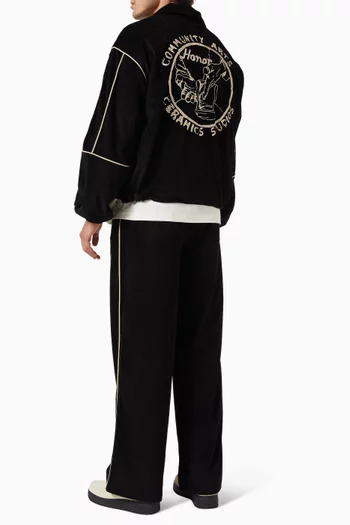 جاكيت رياضي بأشرطة بارزة