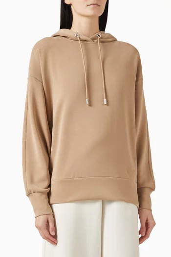 كنزة فضفاضة بغطاء رأس