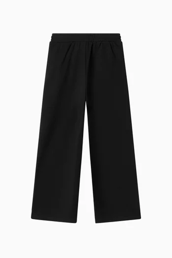 بنطال بقصة ساق واسعة وحزام خصر مطاطي