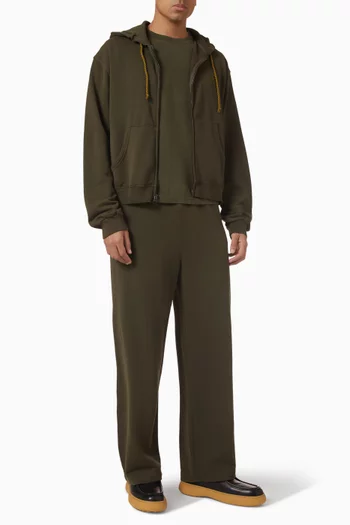 تي شيرت بقصة فضفاضة ولون باهت مزيج قطن وكشمير