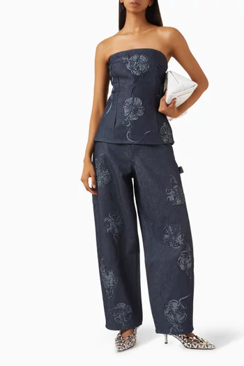 بلوزة مزينة بزهور بارزة دينم