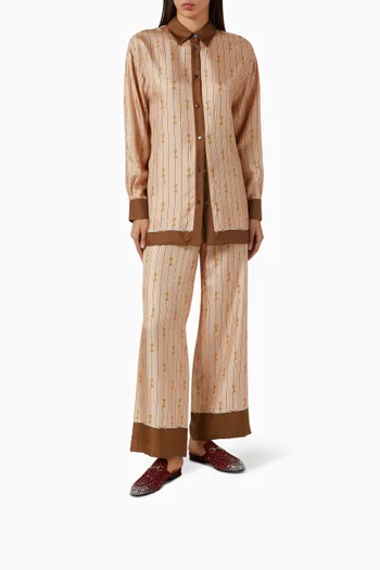 حذاء برينستاون مفتوح من الخلف ومرصع بالكريستال قنب بنقشة شعار حرفي GG‏