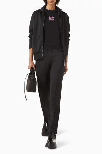 بنطال رياضي بشعار الماركة مقوس