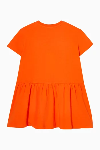 فستان مزين بزهرة وشعار الماركة قطن