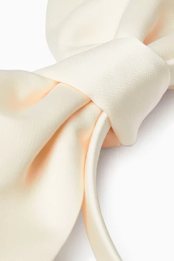 طوق رأس مزين بعقدة بتصميم أوريغامي