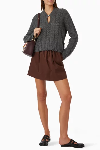 سترة منسوجة بغرزة الضفيرة