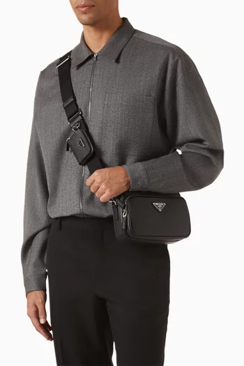 حقيبة كتف بحلية مثلثة وشعار الماركة جلد سافيانو