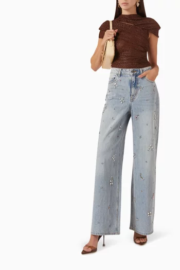 بنطال جينز بقصة ساق واسعة ومطرز دينم