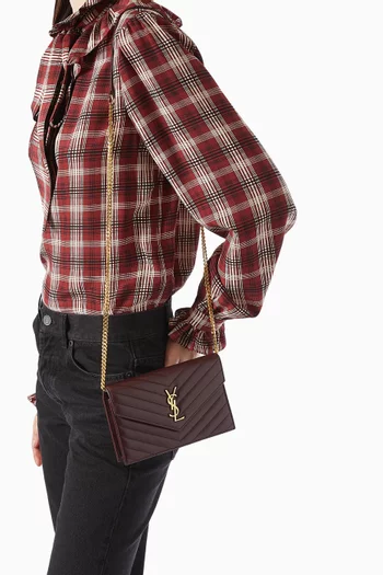 حقيبة صغيرة بسلسلة وتصميم مبطن بشعار كاساندر جلد ماعز