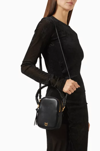 حقيبة صغيرة بيد علوية جلد