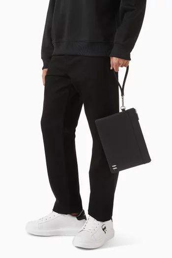 حقيبة ظهر بأحرف الماركة جلد