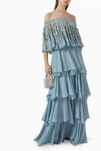 فستان طويل بتطريزات زهور وكشكش