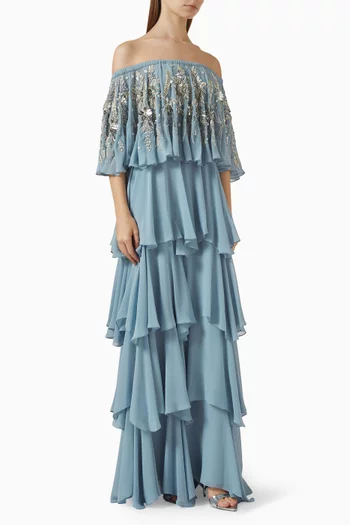 فستان طويل بتطريزات زهور وكشكش