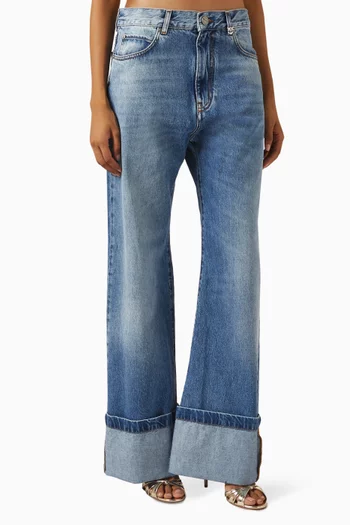 بنطال جينز واندا بقصة ساق واسعة وحواف مطوية دينم