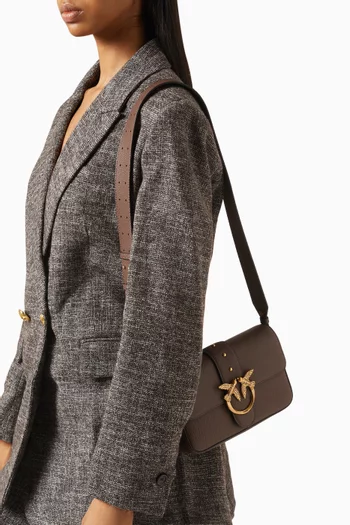 حقيبة كتف لوف وان ميني بتصميم انسيابي جلد