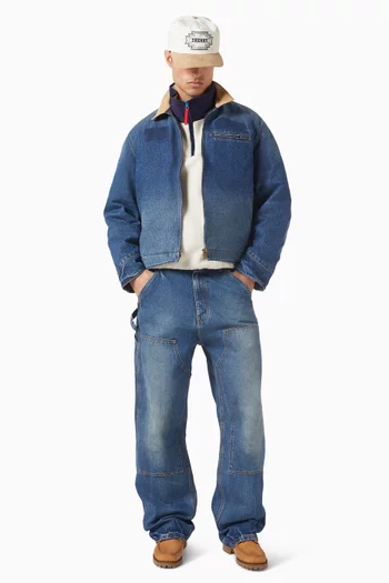 بنطال جينز بساقين واسعتين وطبقة إضافية على الركبتين دينم