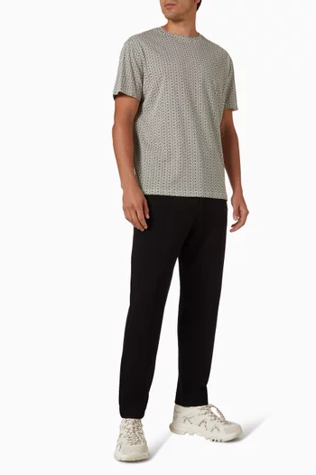 تي شيرت مزين بشعار الماركة قطن