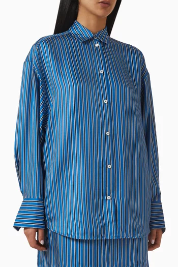 قميص بقصة فضفاضة ونقشة مخططة حرير