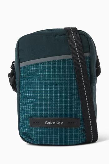 حقيبة ريبورتر بتصميم رفيع بخطوط وسحّاب نايلون