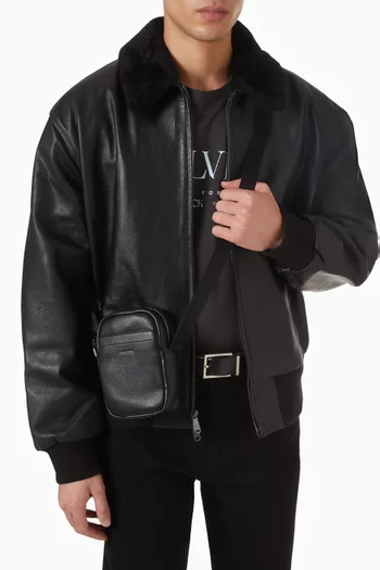 Raised Slim Reporter Crossbody Bag in Faux Leather