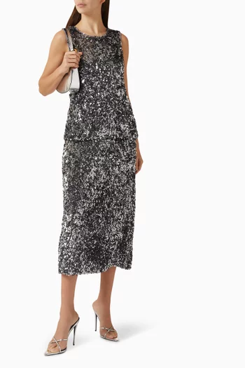 تنورة نايلا متوسطة الطول مزينة بتطريزات بالترتر