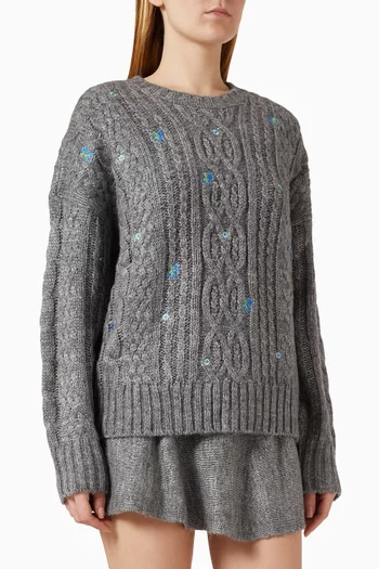 سترة منسوجة مزينة بتطريزات