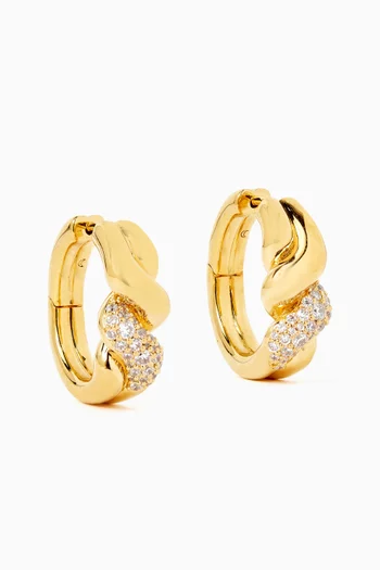 أقراط دائرية مولتن سنو بتصميم ملفوف