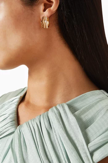 أقراط دائرية مولتن سنو مرصعة بأحجار بافيه نحاس مطلي ذهب عيار 18