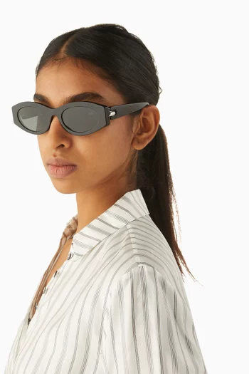 نظارة شمسية بثقوب وإطار بيضاوي أسيتات