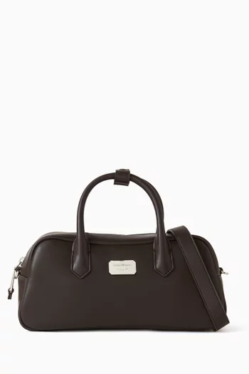 حقيبة يد بشعار الماركة جلد