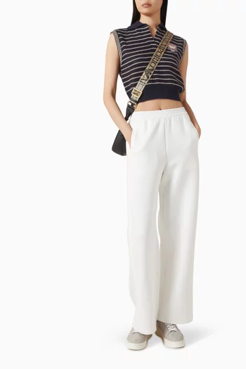 سترة منسوجة بياقة بولو ونقشة مخططة