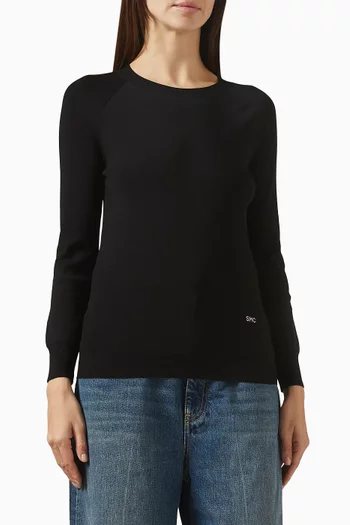 بلوزة مطرزة بشعار الماركة نسيج مضغوط