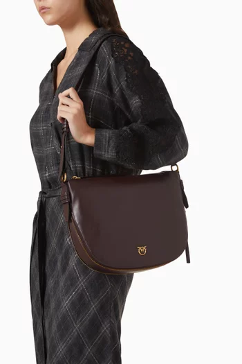 حقيبة هوبو بسحّاب محيط جلد عجل