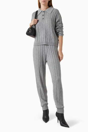 سترة بولو بأزرار منسوجة بغرزة الضفيرة