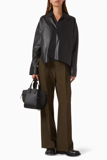 قميص بقصة ترابيز جلد