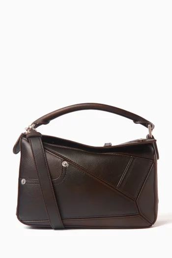 حقيبة بازل صغيرة بتصميم بنطال جلد