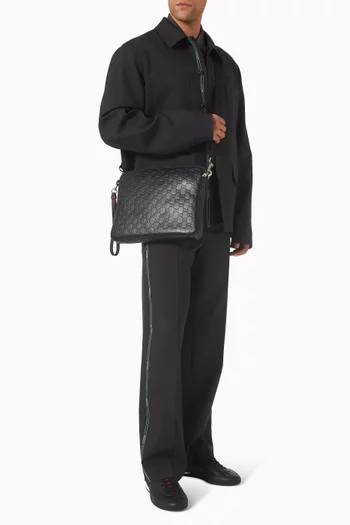 حقيبة كروس متوسطة بشعار حرفي GG جلد