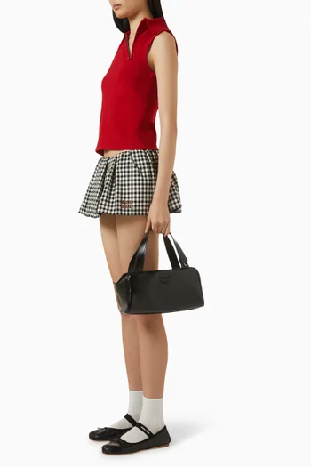 حقيبة بيد علوية وشعار الماركة جلد عجل