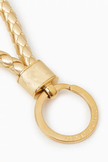 سلسلة مفاتيح جلد مجدول بملمس ستان