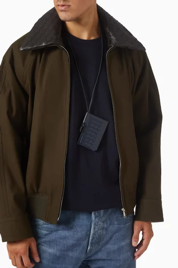 حافظة شارة بيكولو جلد مجدول