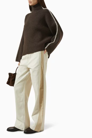 بنطال جينز لوغان بتصميم مقسم لأجزاء وقصة ساق واسعة دينم