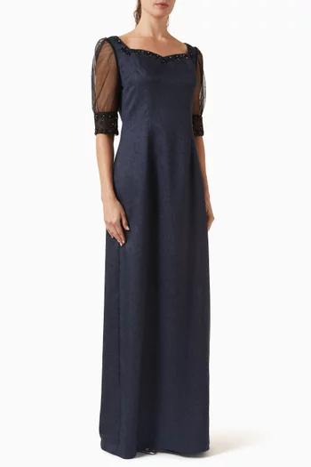 فستان مزين بتطريزات بالخرز