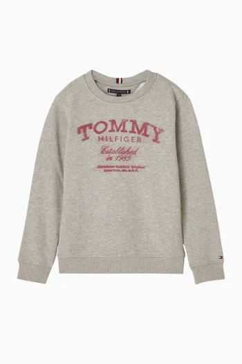 سويت شيرت بطبعة بلون باهت