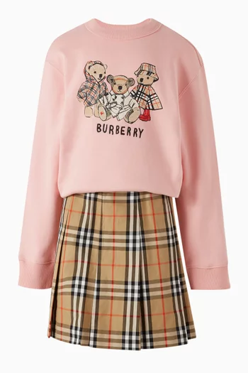 تنورة بطيات ونقشة مربعات تويل