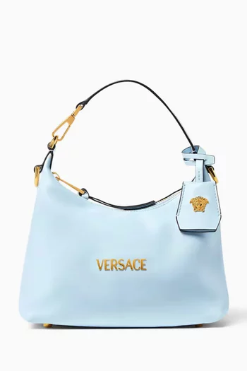 حقيبة هوبو بشارة جلد نابا