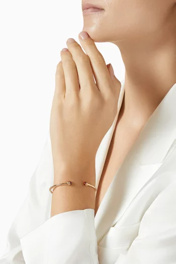 سوار مفتوح بوزيشن مرصع بعقيق أحمر ذهب وردي عيار 18