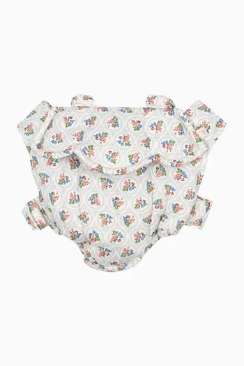 حامل دمى مزين بتطريزات فواكه