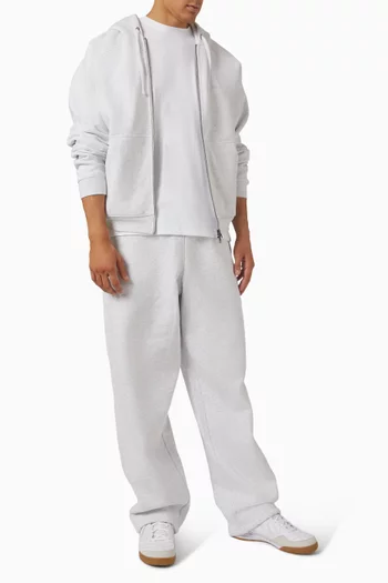 تي شيرت بشعار الماركة بخط يدوي صغير قطن