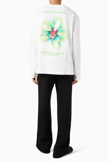 تي شيرت بطبعة زهرة أوركيد مشوشة قطن