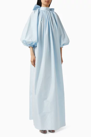 فستان كريما طويل بأكمام منفوخة